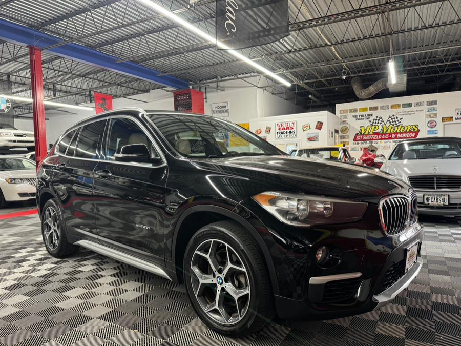 2018 BMW X1 xDrive28i Sports Activity Vehicle, available for sale in West Babylon , New York | MP Motors Inc. West Babylon , New York