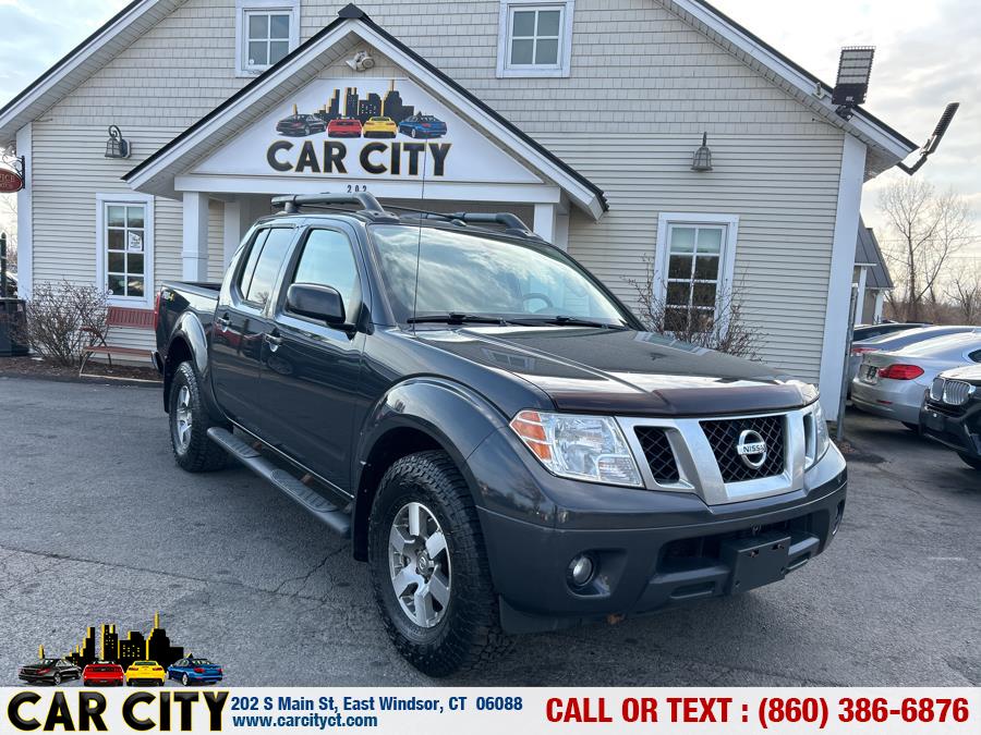 2013 Nissan Frontier 4WD Crew Cab SWB Auto SL, available for sale in East Windsor, Connecticut | Car City LLC. East Windsor, Connecticut