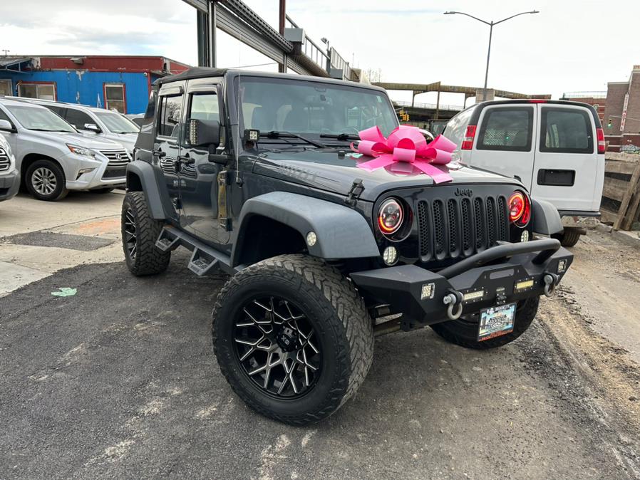 2016 Jeep Wrangler Unlimited 4WD 4dr Willys Wheeler, available for sale in Brooklyn, New York | Brooklyn Auto Mall LLC. Brooklyn, New York