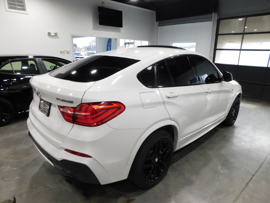 2017 BMW X4 M40i Sports Activity Coupe, available for sale in Lodi, New Jersey | Soliman Motors. Lodi, New Jersey 2017 BMW X4 M40i Sports Activity Coupe, available for sale in Lodi, New Jersey | Soliman Motors. Lodi, New Jersey