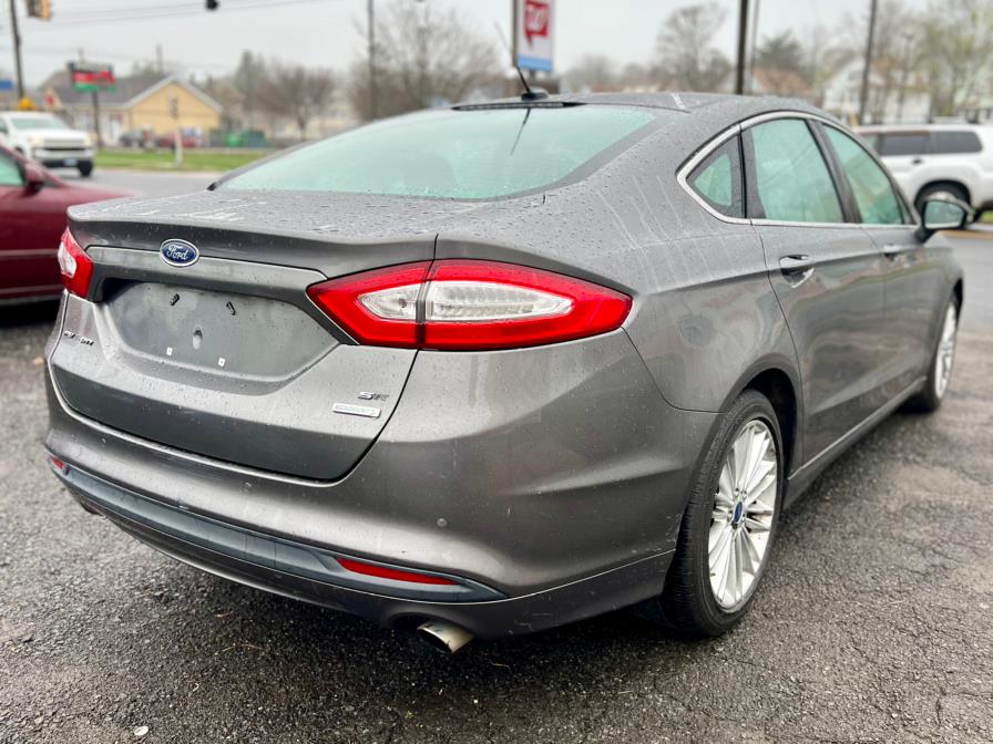2013 Ford Fusion 4dr Sdn SE FWD, available for sale in Wallingford, Connecticut | Wallingford Auto Center LLC. Wallingford, Connecticut 2013 Ford Fusion 4dr Sdn SE FWD, available for sale in Wallingford, Connecticut | Wallingford Auto Center LLC. Wallingford, Connecticut