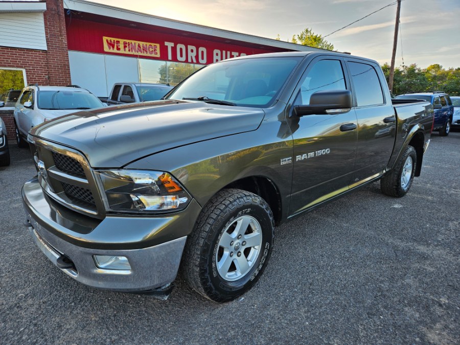 2012 Ram 1500 4WD Crew Cab 140.5" Outdoorsman, available for sale in East Windsor, Connecticut | Toro Auto. East Windsor, Connecticut