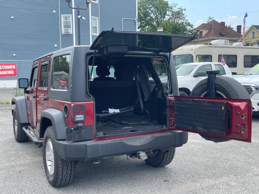 2013 Jeep Wrangler Unlimited 4WD 4dr Sport, available for sale in Irvington , New Jersey | Auto Haus of Irvington Corp. Irvington , New Jersey 2013 Jeep Wrangler Unlimited 4WD 4dr Sport, available for sale in Irvington , New Jersey | Auto Haus of Irvington Corp. Irvington , New Jersey