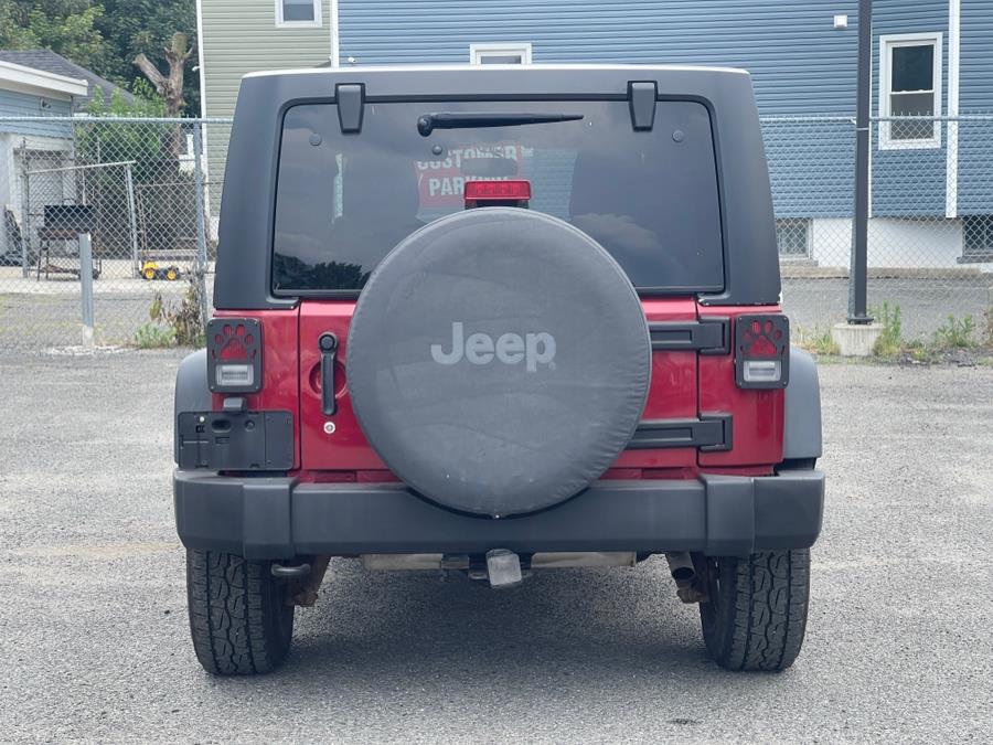 2013 Jeep Wrangler Unlimited 4WD 4dr Sport, available for sale in Irvington , New Jersey | Auto Haus of Irvington Corp. Irvington , New Jersey 2013 Jeep Wrangler Unlimited 4WD 4dr Sport, available for sale in Irvington , New Jersey | Auto Haus of Irvington Corp. Irvington , New Jersey