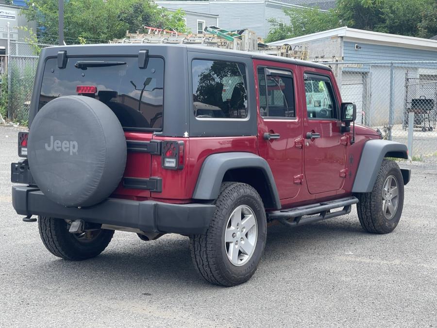 2013 Jeep Wrangler Unlimited 4WD 4dr Sport, available for sale in Irvington , New Jersey | Auto Haus of Irvington Corp. Irvington , New Jersey 2013 Jeep Wrangler Unlimited 4WD 4dr Sport, available for sale in Irvington , New Jersey | Auto Haus of Irvington Corp. Irvington , New Jersey
