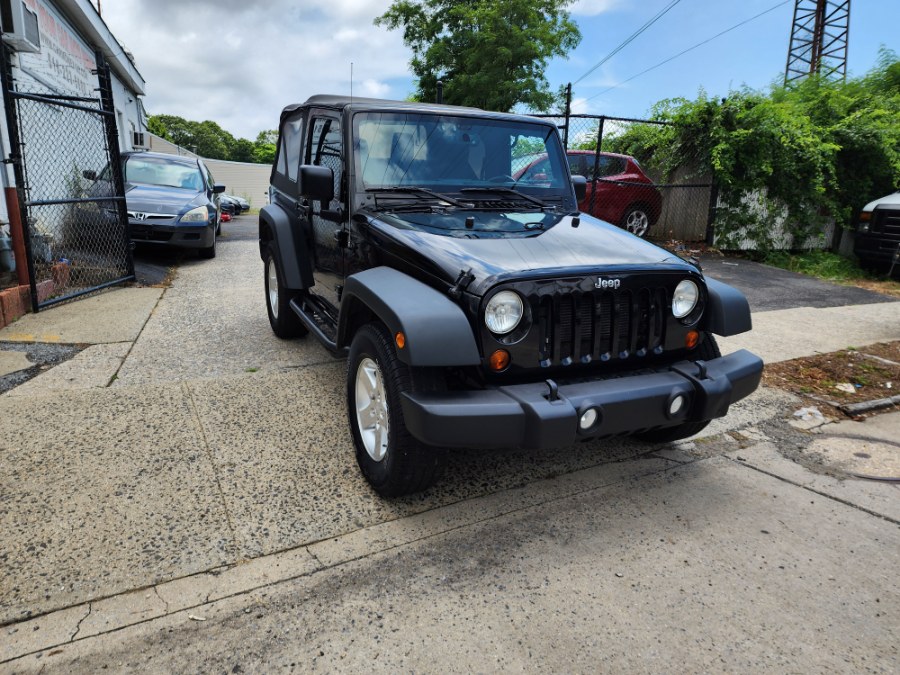 2013 Jeep Wrangler 4WD 2dr Sport, available for sale in Baldwin, New York | Carmoney Auto Sales. Baldwin, New York 2013 Jeep Wrangler 4WD 2dr Sport, available for sale in Baldwin, New York | Carmoney Auto Sales. Baldwin, New York