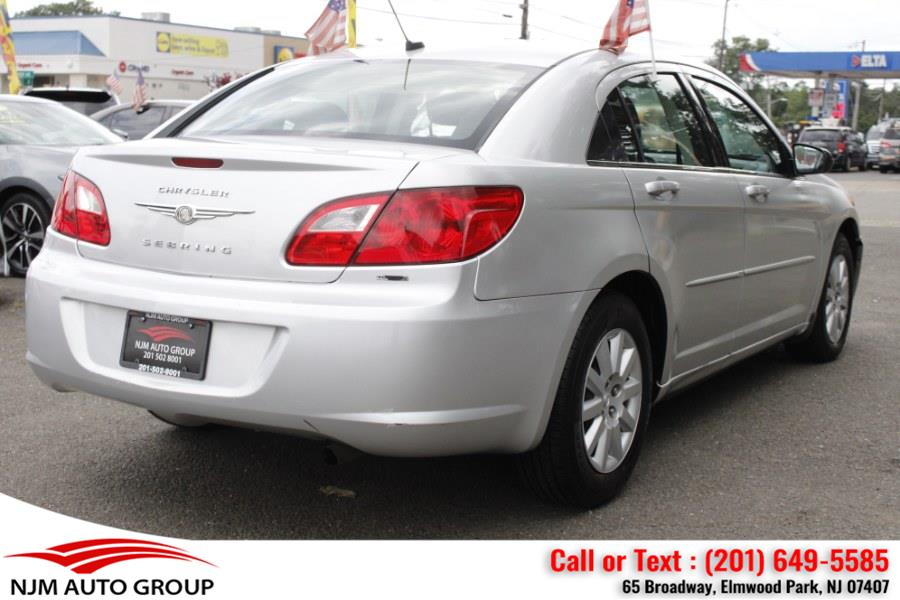 2010 Chrysler Sebring 4dr Sdn Touring, available for sale in Elmwood Park, New Jersey | NJM Auto Group. Elmwood Park, New Jersey 2010 Chrysler Sebring 4dr Sdn Touring, available for sale in Elmwood Park, New Jersey | NJM Auto Group. Elmwood Park, New Jersey