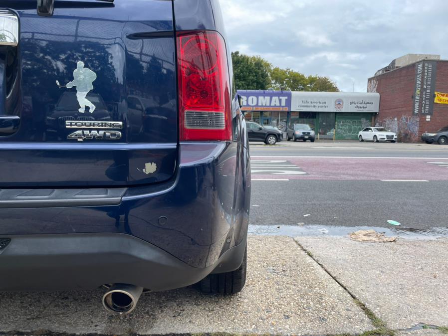 2013 Honda Pilot 4WD 4dr Touring w/RES & Navi, available for sale in BROOKLYN, New York | Deals on Wheels International Auto. BROOKLYN, New York 2013 Honda Pilot 4WD 4dr Touring w/RES & Navi, available for sale in BROOKLYN, New York | Deals on Wheels International Auto. BROOKLYN, New York