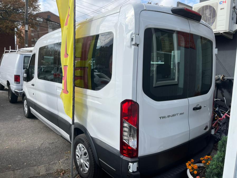 2022 Ford Transit Passenger Wagon T-350 148" Med Roof XLT RWD, available for sale in Corona, New York | Raymonds Cars Inc. Corona, New York 2022 Ford Transit Passenger Wagon T-350 148" Med Roof XLT RWD, available for sale in Corona, New York | Raymonds Cars Inc. Corona, New York