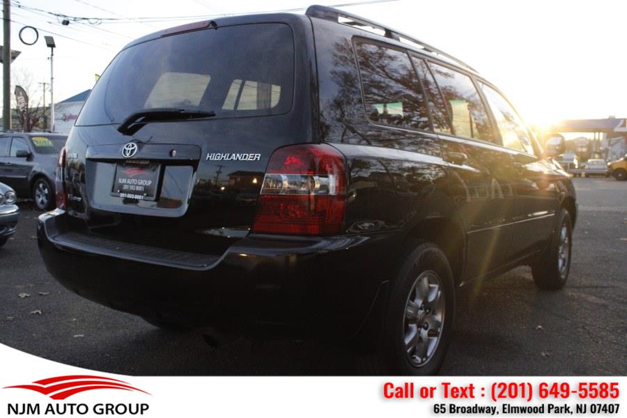 2006 Toyota Highlander 4dr V6 4WD w/3rd Row, available for sale in Elmwood Park, New Jersey | NJM Auto Group. Elmwood Park, New Jersey 2006 Toyota Highlander 4dr V6 4WD w/3rd Row, available for sale in Elmwood Park, New Jersey | NJM Auto Group. Elmwood Park, New Jersey
