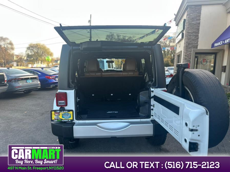 2013 Jeep Wrangler Unlimited 4WD 4dr Sahara, available for sale in Freeport, New York | Carmart One LLC. Freeport, New York 2013 Jeep Wrangler Unlimited 4WD 4dr Sahara, available for sale in Freeport, New York | Carmart One LLC. Freeport, New York