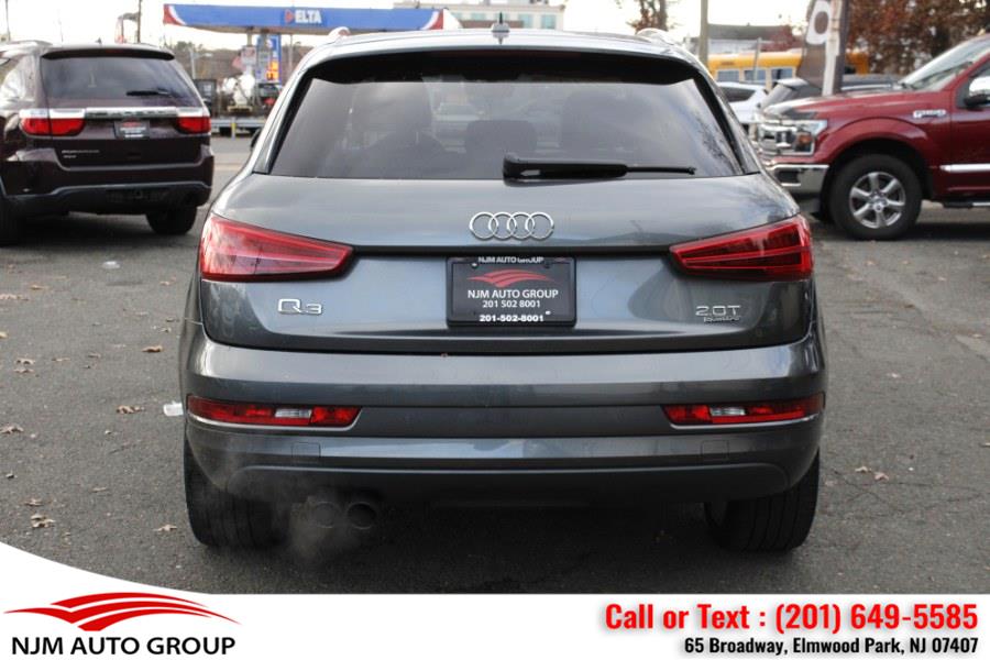 2018 Audi Q3 2.0 TFSI Sport Premium Plus quattro AWD, available for sale in Elmwood Park, New Jersey | NJM Auto Group. Elmwood Park, New Jersey 2018 Audi Q3 2.0 TFSI Sport Premium Plus quattro AWD, available for sale in Elmwood Park, New Jersey | NJM Auto Group. Elmwood Park, New Jersey
