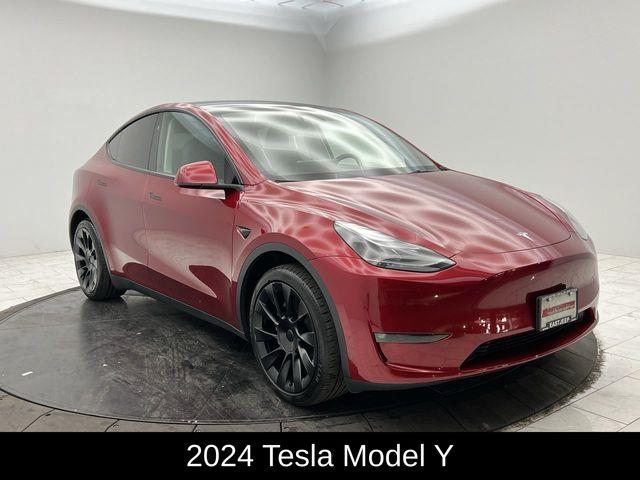 Used 2024 Tesla Model Y Long Range with VIN 7SAYGAEE7RF027576 for sale in Bronx, NY