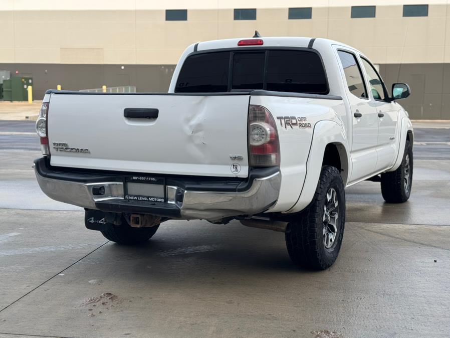 2014 Toyota Tacoma 4WD Double Cab V6 AT (Natl), available for sale in Salt Lake City, Utah | New Level Motors. Salt Lake City, Utah 2014 Toyota Tacoma 4WD Double Cab V6 AT (Natl), available for sale in Salt Lake City, Utah | New Level Motors. Salt Lake City, Utah