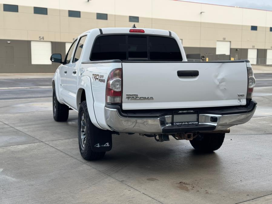2014 Toyota Tacoma 4WD Double Cab V6 AT (Natl), available for sale in Salt Lake City, Utah | New Level Motors. Salt Lake City, Utah 2014 Toyota Tacoma 4WD Double Cab V6 AT (Natl), available for sale in Salt Lake City, Utah | New Level Motors. Salt Lake City, Utah