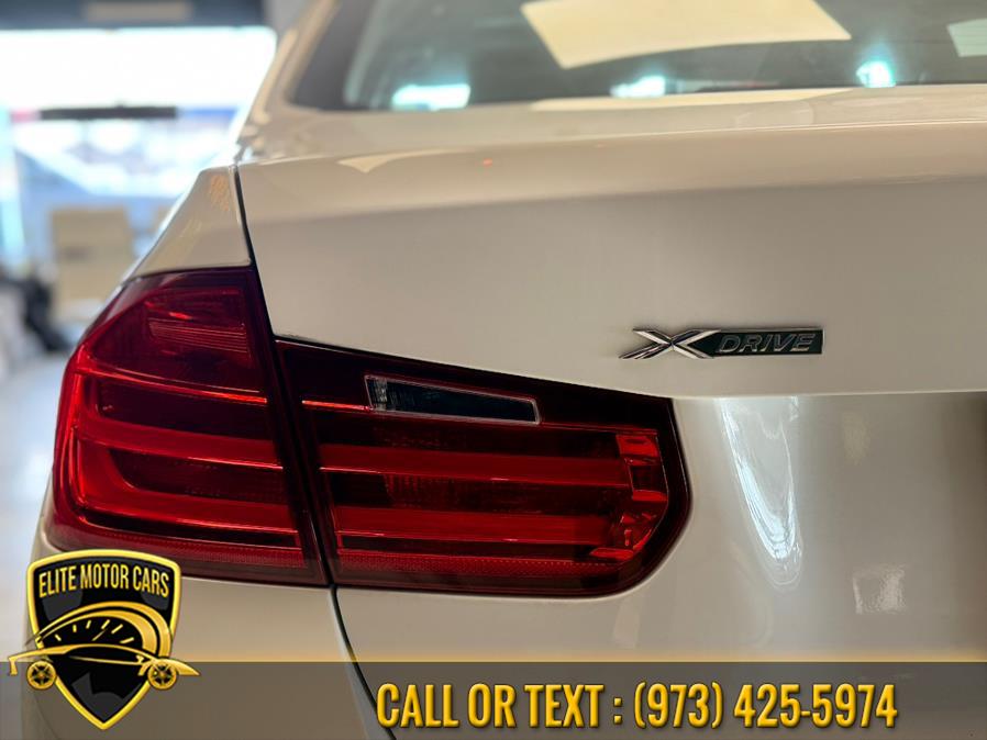 2013 BMW 3 Series 4dr Sdn 328i xDrive AWD SULEV, available for sale in Newark, New Jersey | Elite Motor Cars. Newark, New Jersey 2013 BMW 3 Series 4dr Sdn 328i xDrive AWD SULEV, available for sale in Newark, New Jersey | Elite Motor Cars. Newark, New Jersey