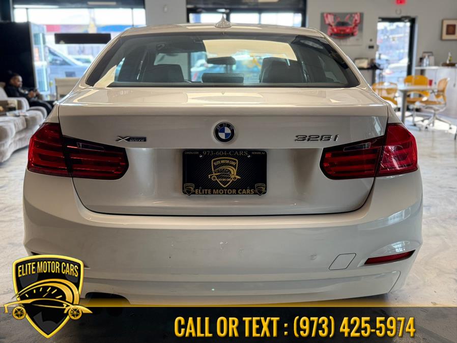 2013 BMW 3 Series 4dr Sdn 328i xDrive AWD SULEV, available for sale in Newark, New Jersey | Elite Motor Cars. Newark, New Jersey 2013 BMW 3 Series 4dr Sdn 328i xDrive AWD SULEV, available for sale in Newark, New Jersey | Elite Motor Cars. Newark, New Jersey