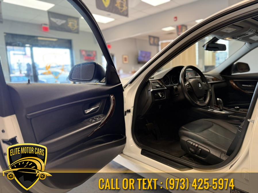 2013 BMW 3 Series 4dr Sdn 328i xDrive AWD SULEV, available for sale in Newark, New Jersey | Elite Motor Cars. Newark, New Jersey 2013 BMW 3 Series 4dr Sdn 328i xDrive AWD SULEV, available for sale in Newark, New Jersey | Elite Motor Cars. Newark, New Jersey