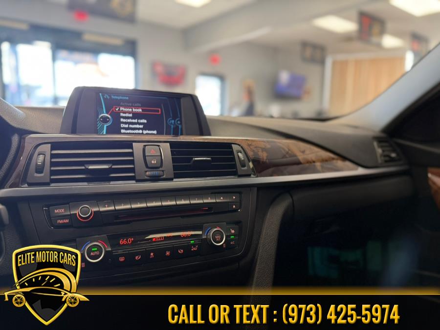 2013 BMW 3 Series 4dr Sdn 328i xDrive AWD SULEV, available for sale in Newark, New Jersey | Elite Motor Cars. Newark, New Jersey 2013 BMW 3 Series 4dr Sdn 328i xDrive AWD SULEV, available for sale in Newark, New Jersey | Elite Motor Cars. Newark, New Jersey