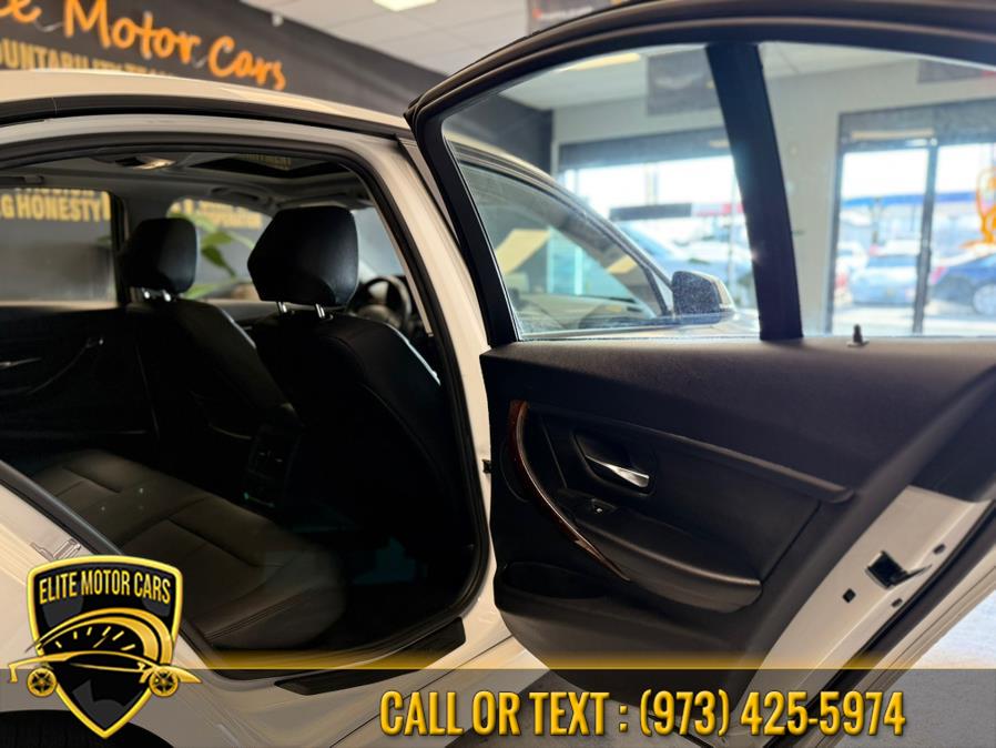 2013 BMW 3 Series 4dr Sdn 328i xDrive AWD SULEV, available for sale in Newark, New Jersey | Elite Motor Cars. Newark, New Jersey 2013 BMW 3 Series 4dr Sdn 328i xDrive AWD SULEV, available for sale in Newark, New Jersey | Elite Motor Cars. Newark, New Jersey