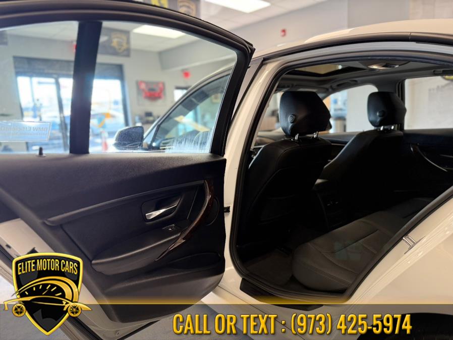 2013 BMW 3 Series 4dr Sdn 328i xDrive AWD SULEV, available for sale in Newark, New Jersey | Elite Motor Cars. Newark, New Jersey 2013 BMW 3 Series 4dr Sdn 328i xDrive AWD SULEV, available for sale in Newark, New Jersey | Elite Motor Cars. Newark, New Jersey