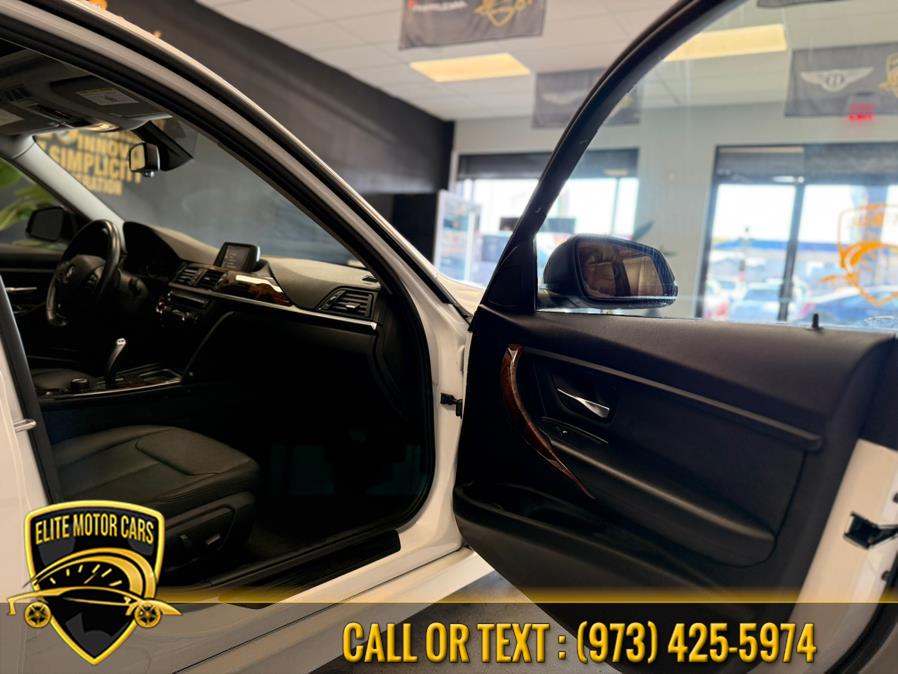 2013 BMW 3 Series 4dr Sdn 328i xDrive AWD SULEV, available for sale in Newark, New Jersey | Elite Motor Cars. Newark, New Jersey 2013 BMW 3 Series 4dr Sdn 328i xDrive AWD SULEV, available for sale in Newark, New Jersey | Elite Motor Cars. Newark, New Jersey