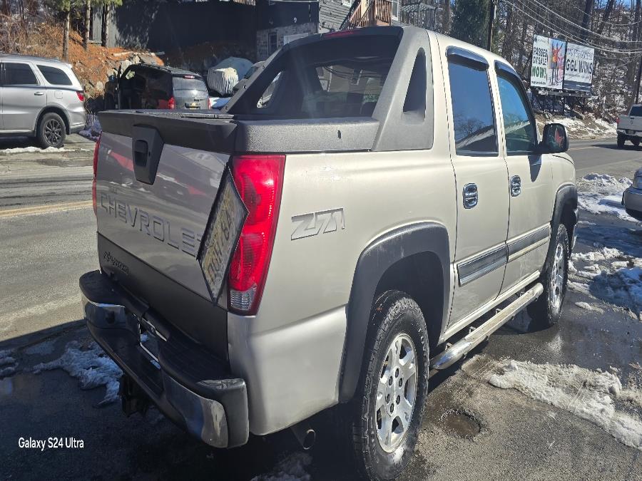 2004 Chevrolet Avalanche 1500 5dr Crew Cab 130" WB 4WD Z71, available for sale in Bloomingdale, New Jersey | Bloomingdale Auto Group. Bloomingdale, New Jersey 2004 Chevrolet Avalanche 1500 5dr Crew Cab 130" WB 4WD Z71, available for sale in Bloomingdale, New Jersey | Bloomingdale Auto Group. Bloomingdale, New Jersey