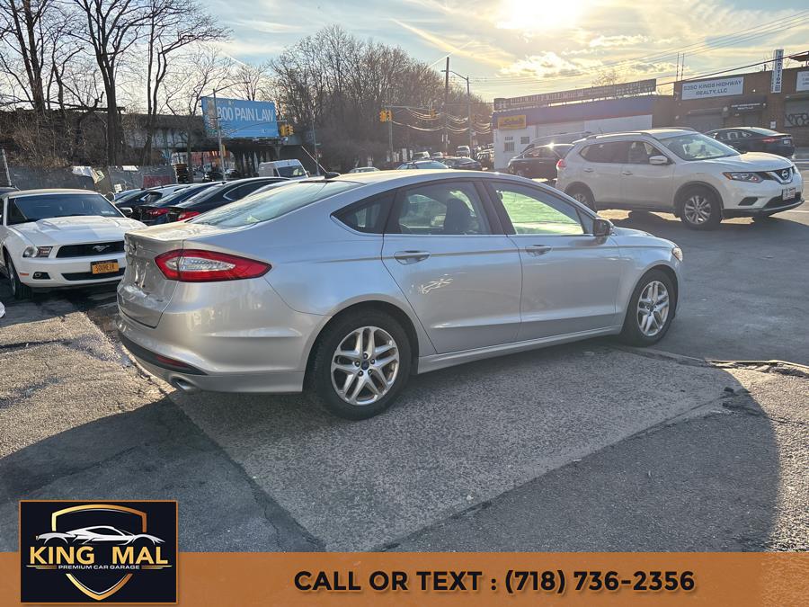 2014 Ford Fusion 4dr Sdn SE FWD, available for sale in Brooklyn, New York | King Mal Used Car and Truck Center. Brooklyn, New York 2014 Ford Fusion 4dr Sdn SE FWD, available for sale in Brooklyn, New York | King Mal Used Car and Truck Center. Brooklyn, New York