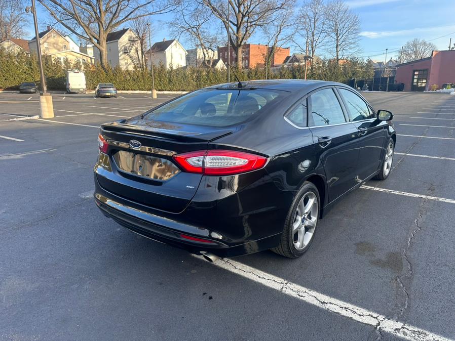 2014 Ford Fusion 4dr Sdn SE FWD, available for sale in Garfield, New Jersey | Mikes Auto Sales LLC. Garfield, New Jersey 2014 Ford Fusion 4dr Sdn SE FWD, available for sale in Garfield, New Jersey | Mikes Auto Sales LLC. Garfield, New Jersey
