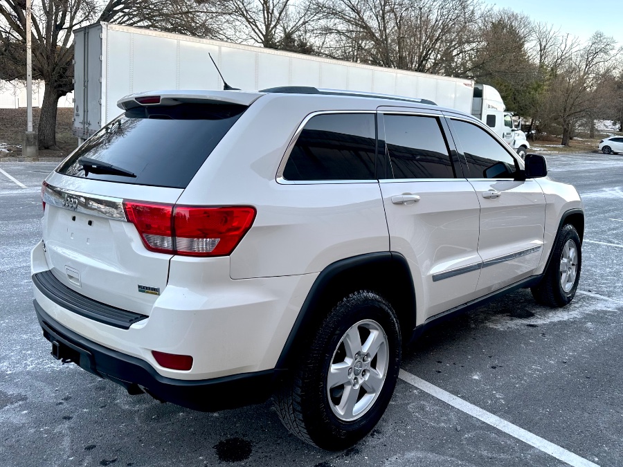 2012 Jeep Grand Cherokee 4WD 4dr Laredo Sport, available for sale in White Plains, New York | Island auto wholesale. White Plains, New York 2012 Jeep Grand Cherokee 4WD 4dr Laredo Sport, available for sale in White Plains, New York | Island auto wholesale. White Plains, New York