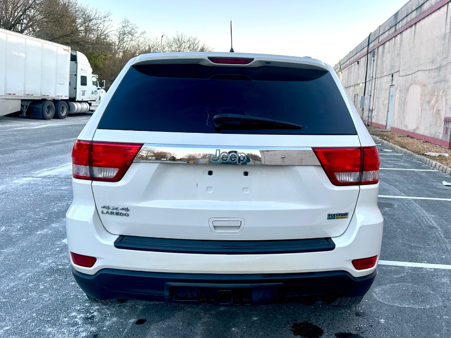 2012 Jeep Grand Cherokee 4WD 4dr Laredo Sport, available for sale in White Plains, New York | Island auto wholesale. White Plains, New York 2012 Jeep Grand Cherokee 4WD 4dr Laredo Sport, available for sale in White Plains, New York | Island auto wholesale. White Plains, New York