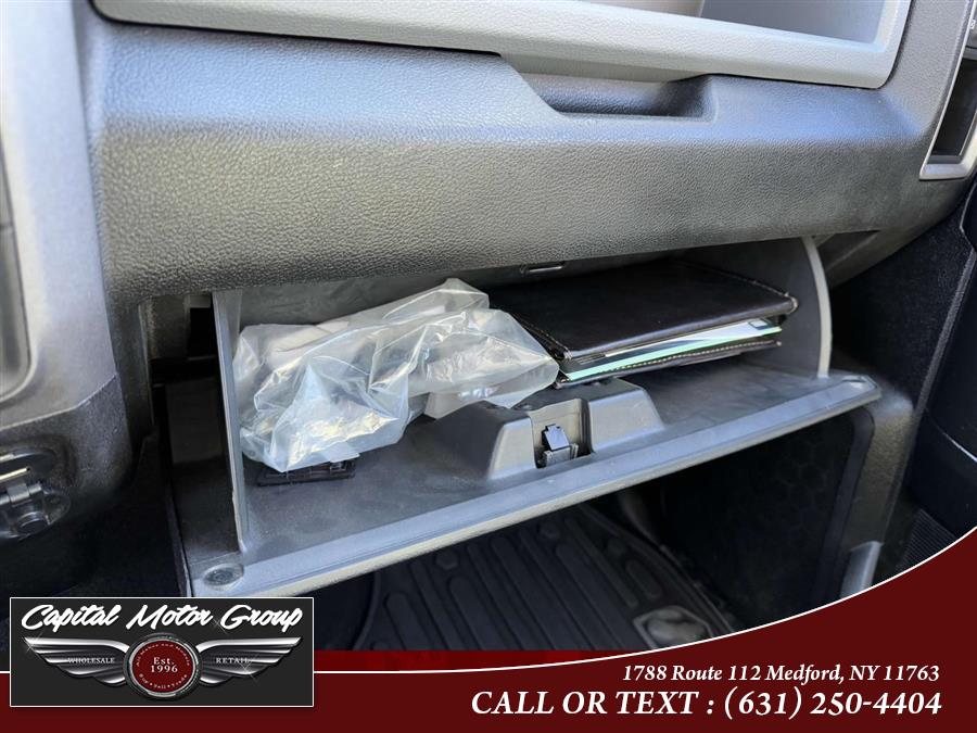 2014 Ram 1500 4WD Quad Cab 140.5" Express, available for sale in Medford, New York | Capital Motor Group Inc. Medford, New York 2014 Ram 1500 4WD Quad Cab 140.5" Express, available for sale in Medford, New York | Capital Motor Group Inc. Medford, New York