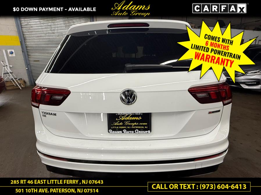 2021 Volkswagen Tiguan 2.0T SE R-Line Black 4MOTION, available for sale in Paterson, New Jersey | Adams Auto Group. Paterson, New Jersey 2021 Volkswagen Tiguan 2.0T SE R-Line Black 4MOTION, available for sale in Paterson, New Jersey | Adams Auto Group. Paterson, New Jersey