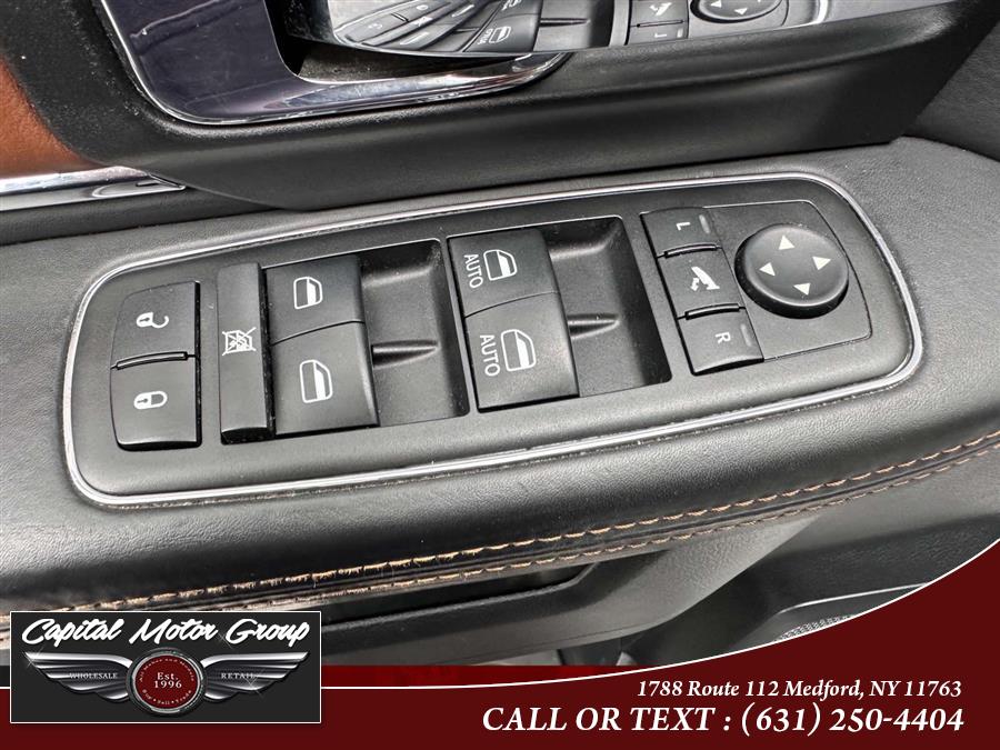 2014 Ram 1500 4WD Crew Cab 140.5" Longhorn Limited, available for sale in Medford, New York | Capital Motor Group Inc. Medford, New York 2014 Ram 1500 4WD Crew Cab 140.5" Longhorn Limited, available for sale in Medford, New York | Capital Motor Group Inc. Medford, New York