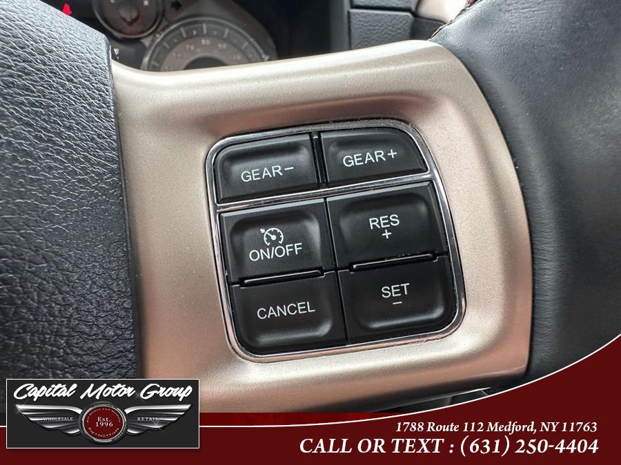 2014 Ram 1500 4WD Crew Cab 140.5" Longhorn Limited, available for sale in Medford, New York | Capital Motor Group Inc. Medford, New York 2014 Ram 1500 4WD Crew Cab 140.5" Longhorn Limited, available for sale in Medford, New York | Capital Motor Group Inc. Medford, New York
