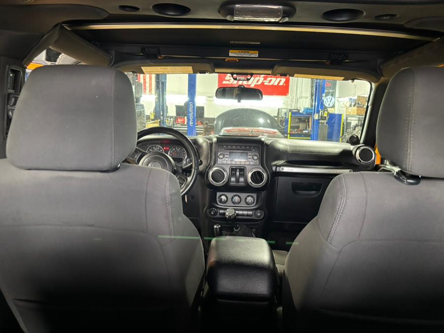 2012 Jeep Wrangler 4WD 2dr Sahara, available for sale in Somers, Connecticut | Four Town Motors LLC. Somers, Connecticut 2012 Jeep Wrangler 4WD 2dr Sahara, available for sale in Somers, Connecticut | Four Town Motors LLC. Somers, Connecticut