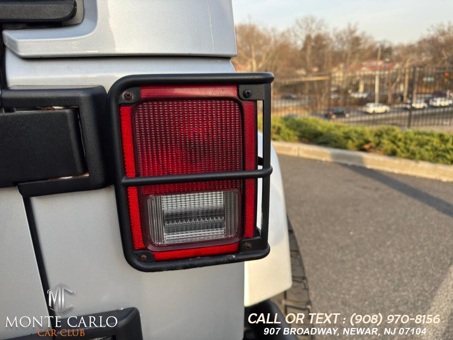 2012 Jeep Wrangler Unlimited 4WD 4dr Sahara, available for sale in Newark, New Jersey | Monte Carlo Car Club llc. Newark, New Jersey 2012 Jeep Wrangler Unlimited 4WD 4dr Sahara, available for sale in Newark, New Jersey | Monte Carlo Car Club llc. Newark, New Jersey