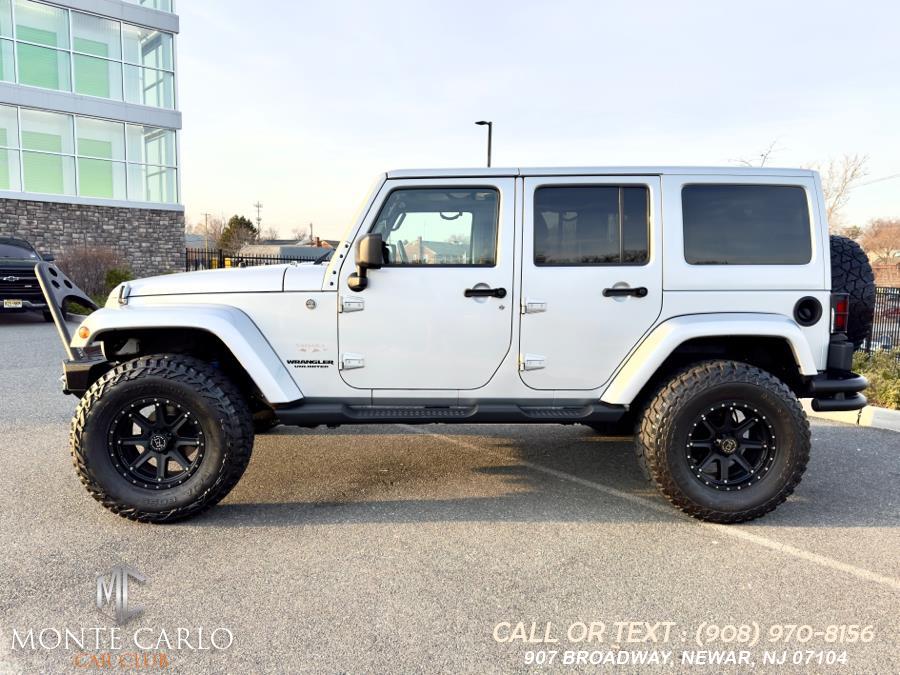2012 Jeep Wrangler Unlimited 4WD 4dr Sahara, available for sale in Newark, New Jersey | Monte Carlo Car Club llc. Newark, New Jersey 2012 Jeep Wrangler Unlimited 4WD 4dr Sahara, available for sale in Newark, New Jersey | Monte Carlo Car Club llc. Newark, New Jersey