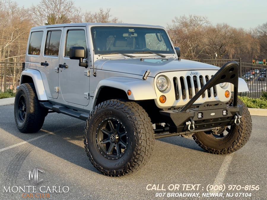 2012 Jeep Wrangler Unlimited 4WD 4dr Sahara, available for sale in Newark, New Jersey | Monte Carlo Car Club llc. Newark, New Jersey 2012 Jeep Wrangler Unlimited 4WD 4dr Sahara, available for sale in Newark, New Jersey | Monte Carlo Car Club llc. Newark, New Jersey