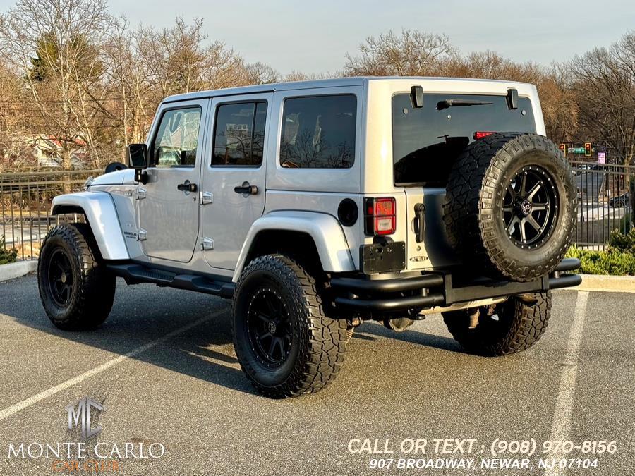 2012 Jeep Wrangler Unlimited 4WD 4dr Sahara, available for sale in Newark, New Jersey | Monte Carlo Car Club llc. Newark, New Jersey 2012 Jeep Wrangler Unlimited 4WD 4dr Sahara, available for sale in Newark, New Jersey | Monte Carlo Car Club llc. Newark, New Jersey
