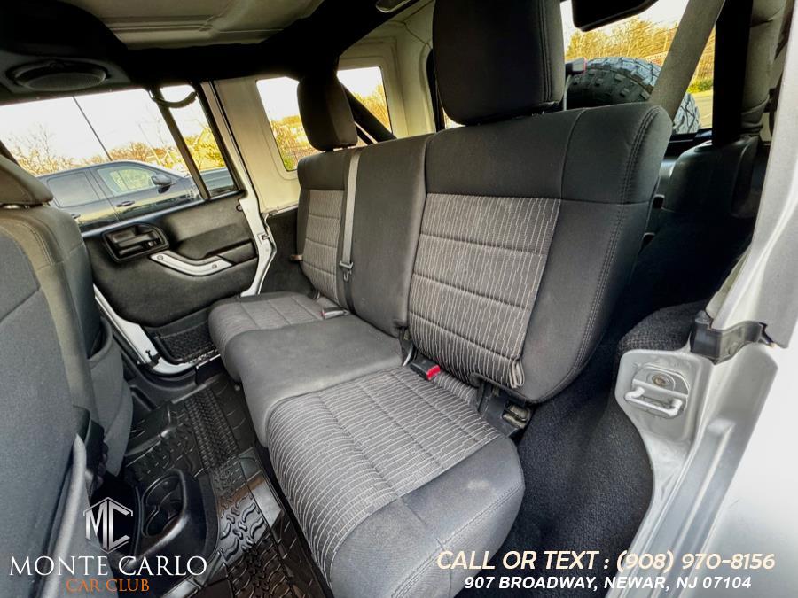 2012 Jeep Wrangler Unlimited 4WD 4dr Sahara, available for sale in Newark, New Jersey | Monte Carlo Car Club llc. Newark, New Jersey 2012 Jeep Wrangler Unlimited 4WD 4dr Sahara, available for sale in Newark, New Jersey | Monte Carlo Car Club llc. Newark, New Jersey