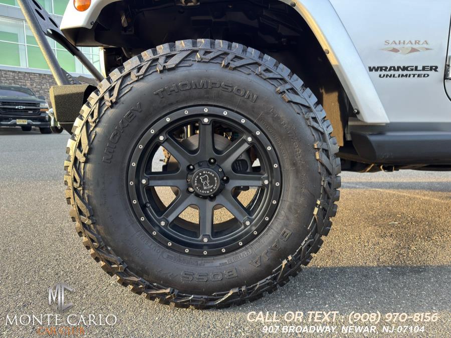 2012 Jeep Wrangler Unlimited 4WD 4dr Sahara, available for sale in Newark, New Jersey | Monte Carlo Car Club llc. Newark, New Jersey 2012 Jeep Wrangler Unlimited 4WD 4dr Sahara, available for sale in Newark, New Jersey | Monte Carlo Car Club llc. Newark, New Jersey
