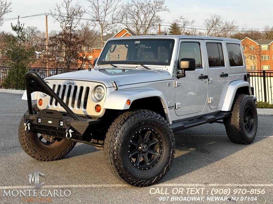 2012 Jeep Wrangler Unlimited 4WD 4dr Sahara, available for sale in Newark, New Jersey | Monte Carlo Car Club llc. Newark, New Jersey 2012 Jeep Wrangler Unlimited 4WD 4dr Sahara, available for sale in Newark, New Jersey | Monte Carlo Car Club llc. Newark, New Jersey