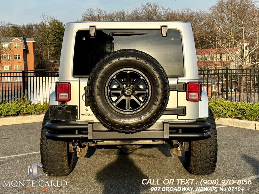 2012 Jeep Wrangler Unlimited 4WD 4dr Sahara, available for sale in Newark, New Jersey | Monte Carlo Car Club llc. Newark, New Jersey 2012 Jeep Wrangler Unlimited 4WD 4dr Sahara, available for sale in Newark, New Jersey | Monte Carlo Car Club llc. Newark, New Jersey