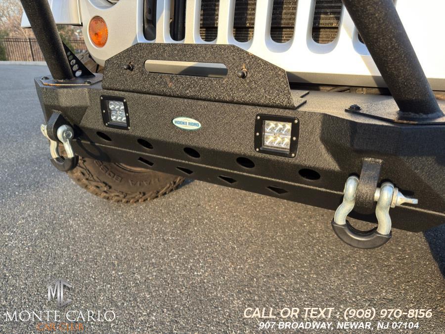 2012 Jeep Wrangler Unlimited 4WD 4dr Sahara, available for sale in Newark, New Jersey | Monte Carlo Car Club llc. Newark, New Jersey 2012 Jeep Wrangler Unlimited 4WD 4dr Sahara, available for sale in Newark, New Jersey | Monte Carlo Car Club llc. Newark, New Jersey