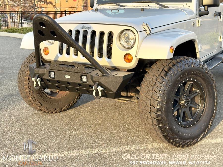 2012 Jeep Wrangler Unlimited 4WD 4dr Sahara, available for sale in Newark, New Jersey | Monte Carlo Car Club llc. Newark, New Jersey 2012 Jeep Wrangler Unlimited 4WD 4dr Sahara, available for sale in Newark, New Jersey | Monte Carlo Car Club llc. Newark, New Jersey