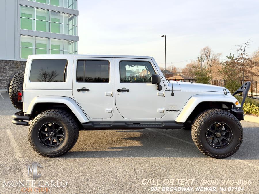 2012 Jeep Wrangler Unlimited 4WD 4dr Sahara, available for sale in Newark, New Jersey | Monte Carlo Car Club llc. Newark, New Jersey 2012 Jeep Wrangler Unlimited 4WD 4dr Sahara, available for sale in Newark, New Jersey | Monte Carlo Car Club llc. Newark, New Jersey