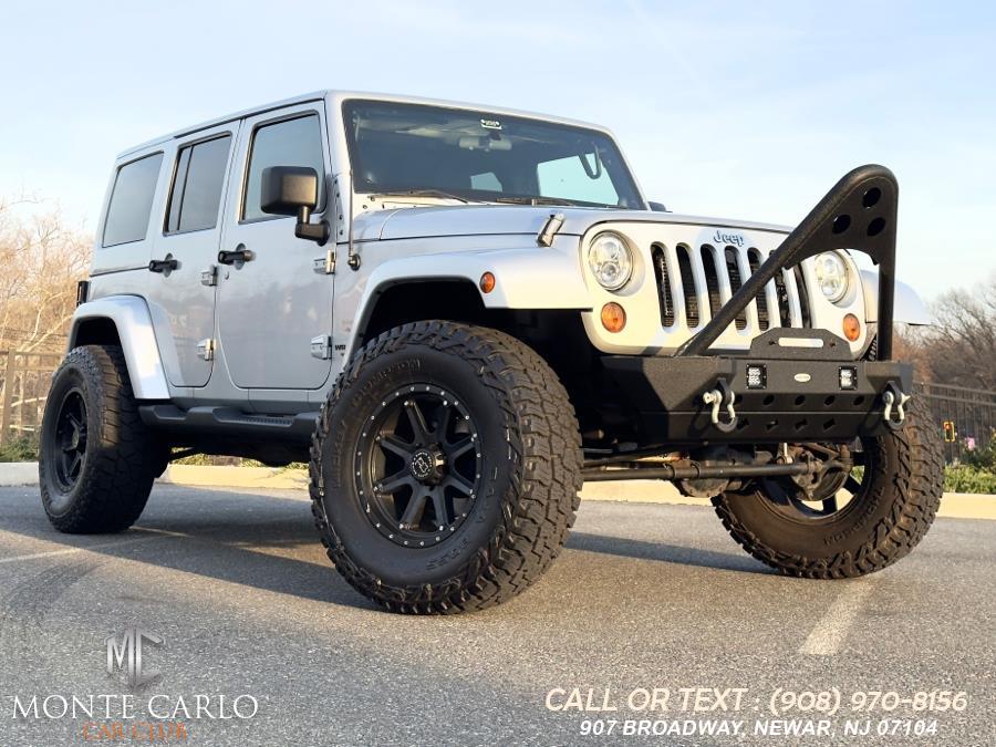 2012 Jeep Wrangler Unlimited 4WD 4dr Sahara, available for sale in Newark, New Jersey | Monte Carlo Car Club llc. Newark, New Jersey 2012 Jeep Wrangler Unlimited 4WD 4dr Sahara, available for sale in Newark, New Jersey | Monte Carlo Car Club llc. Newark, New Jersey