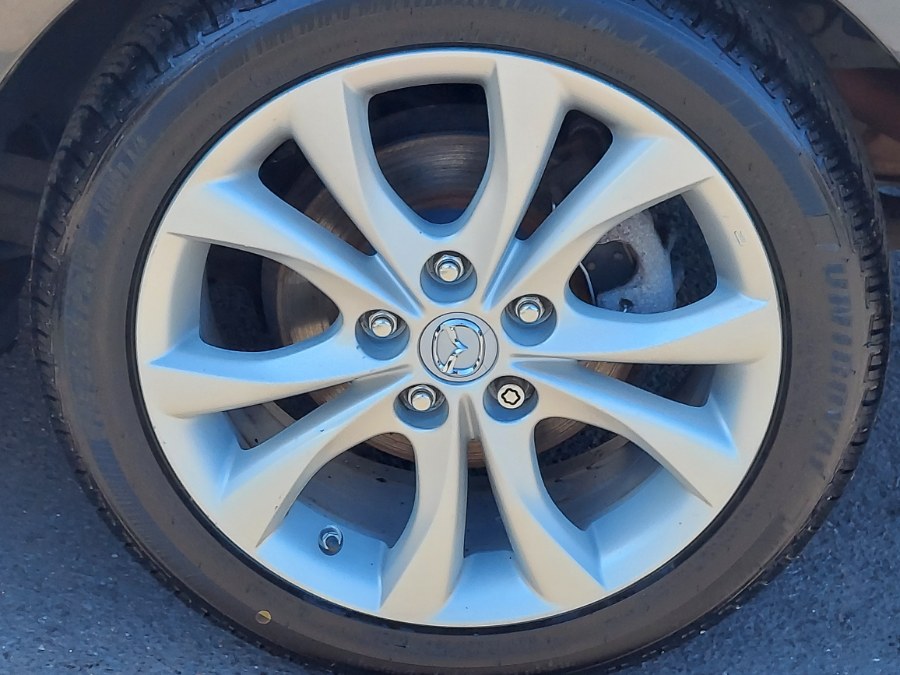 2011 Mazda Mazda3 4dr Sdn Auto s Grand Touring, available for sale in East Windsor, Connecticut | United Auto Sales of E Windsor, Inc. East Windsor, Connecticut 2011 Mazda Mazda3 4dr Sdn Auto s Grand Touring, available for sale in East Windsor, Connecticut | United Auto Sales of E Windsor, Inc. East Windsor, Connecticut