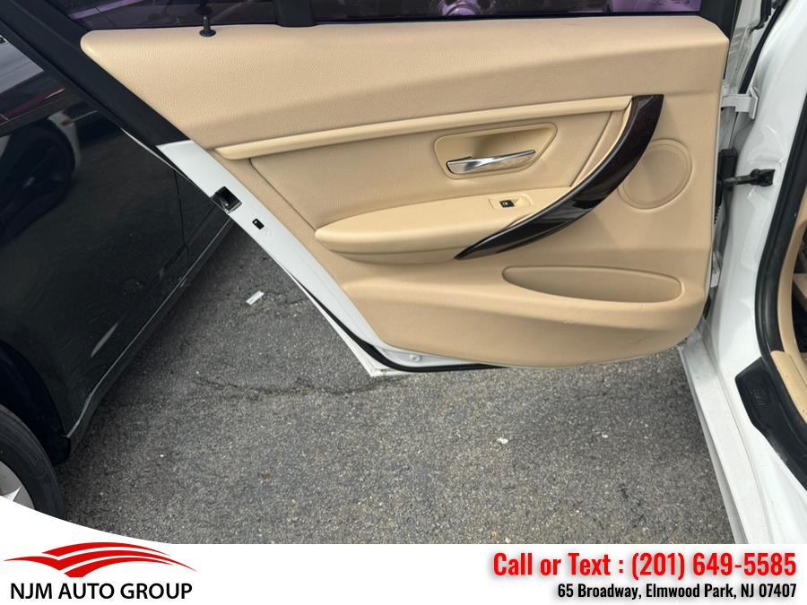 2015 BMW 3 Series 4dr Sdn 320i RWD, available for sale in Elmwood Park, New Jersey | NJM Auto Group. Elmwood Park, New Jersey 2015 BMW 3 Series 4dr Sdn 320i RWD, available for sale in Elmwood Park, New Jersey | NJM Auto Group. Elmwood Park, New Jersey